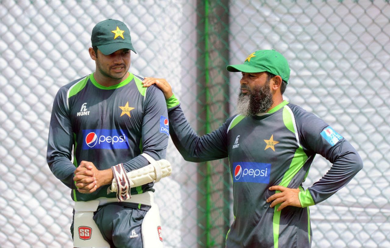 Bowling coach Mushtaq Ahmed chats with ODI captain Azhar Ali at a training session, Galle, June 16, 2015