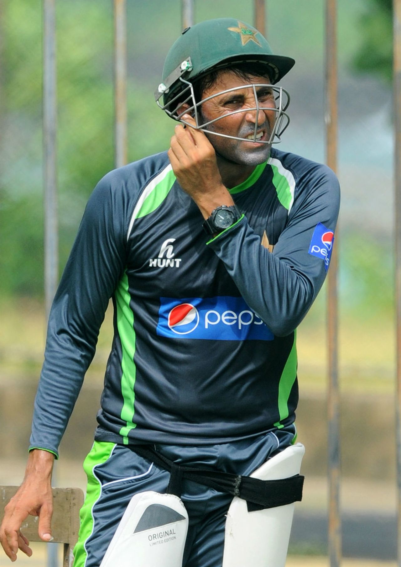 Younis Khan adjusts his helmet during a net session, June 16, 2015