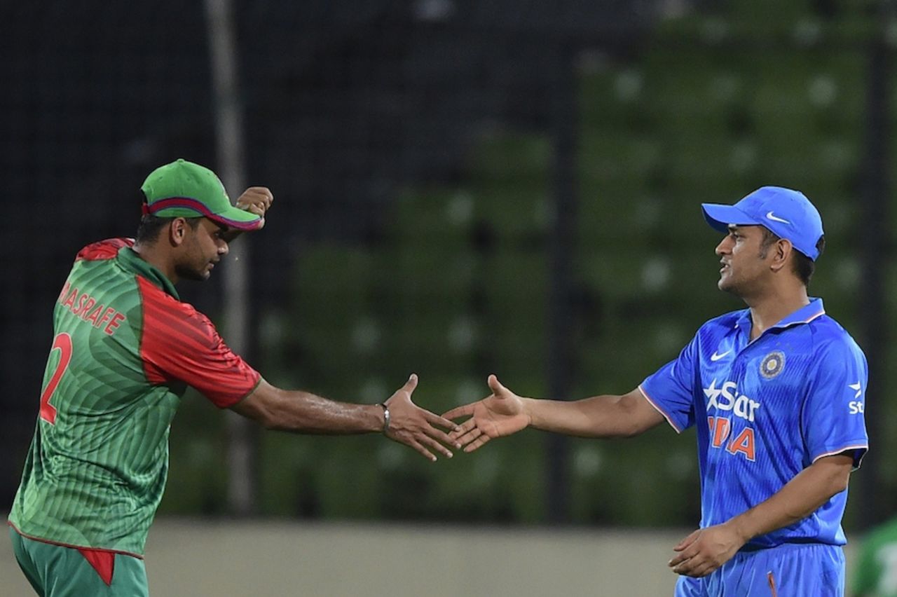 The two captains shake hands after the match, Bangladesh v India, 1st ODI, Mirpur, June 18, 2015