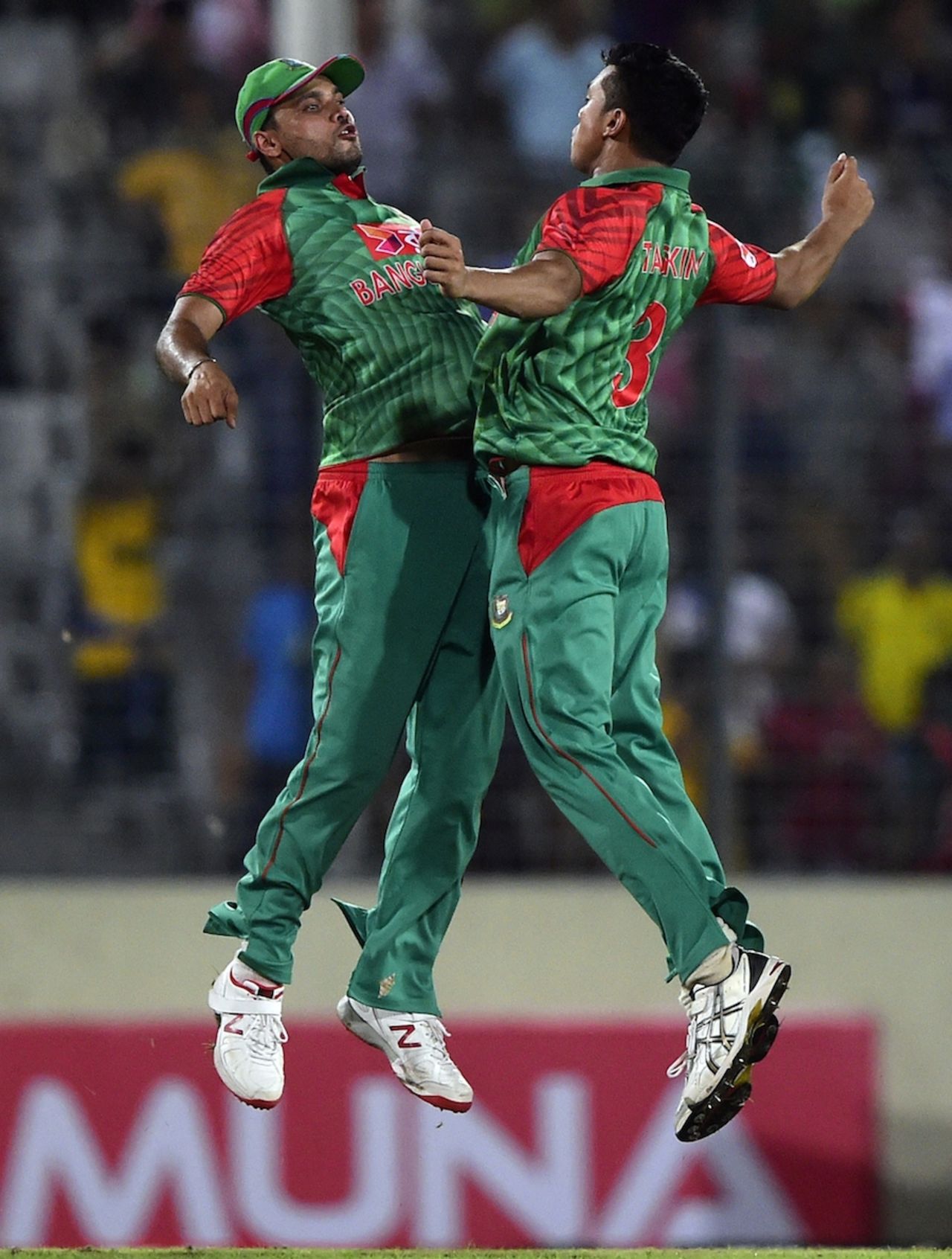 One more time: Mashrafe Mortaza and Taskin Ahmed celebrate in style, Bangladesh v India, 1st ODI, Mirpur, June 18, 2015