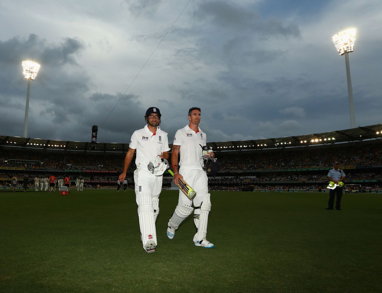 Kevin Pietersen and Alastair Cook walk off the field at close of play, Australia v England, first Test, day three, Brisbane, 4th day, November 23, 2013