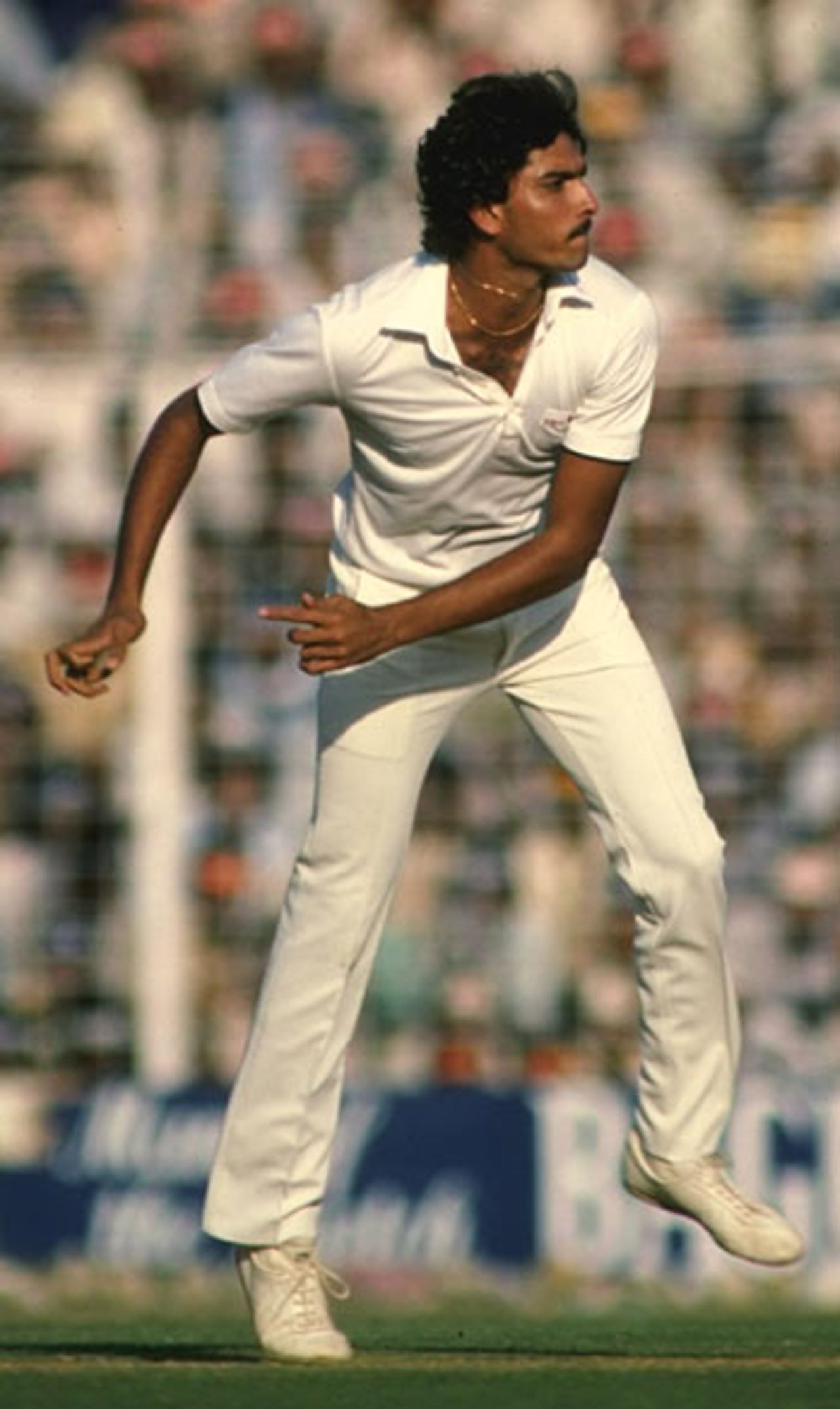 Ravi Shastri bowling, India v West Indies, Calcutta, December 1982