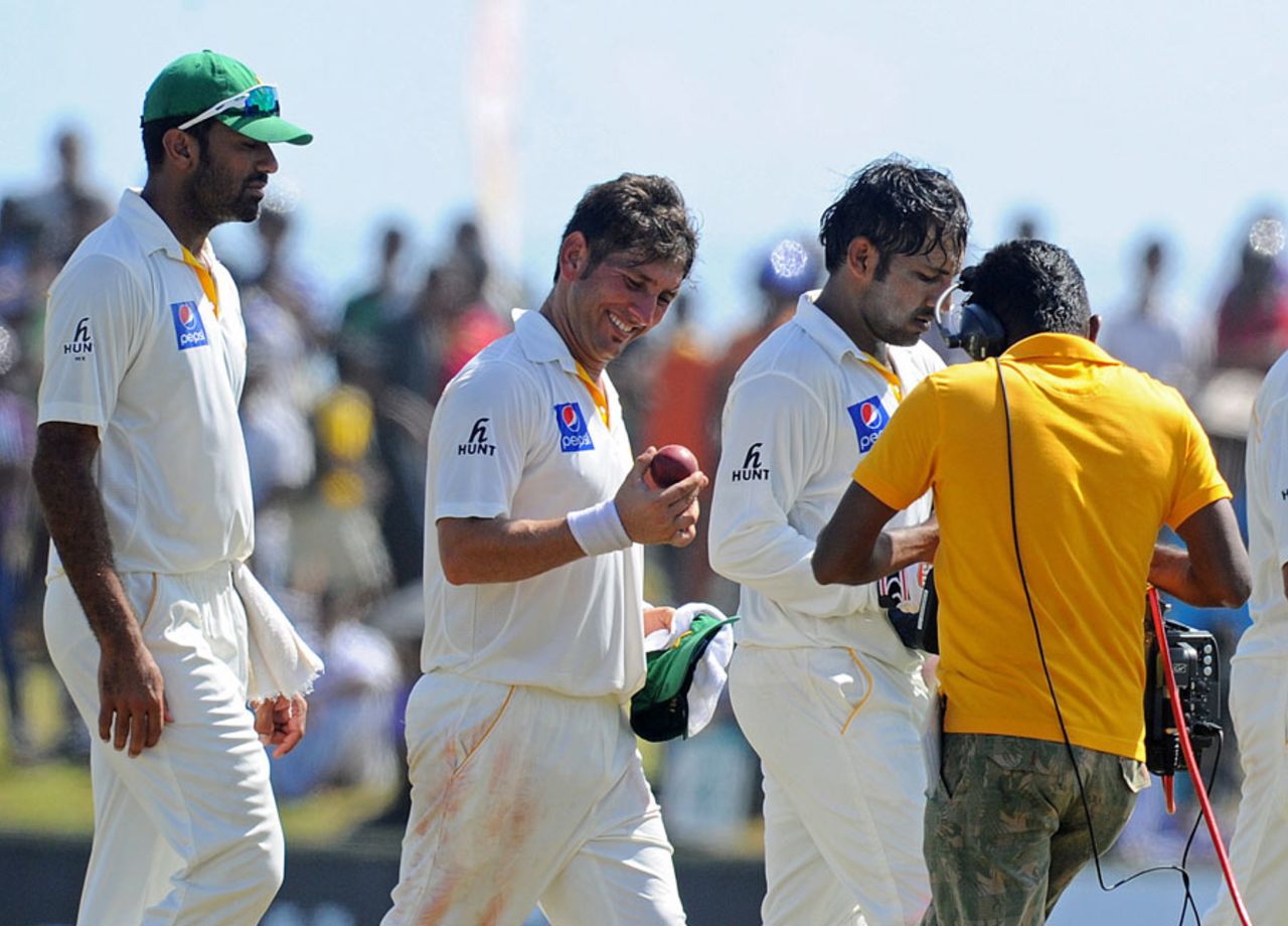 An elated Yasir Shah walks off after taking 7 for 76, 1st Test, Galle, 5th day, June 21, 2015