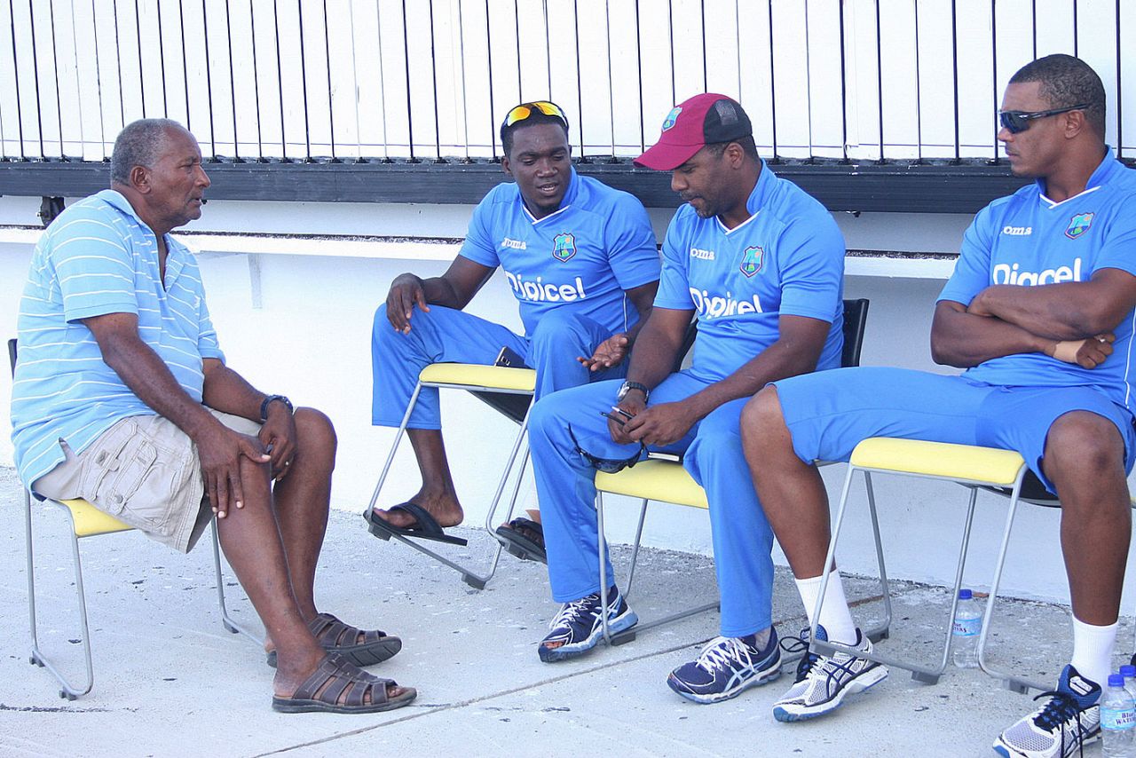 Andy Roberts has a chat with a few West Indies players during a training camp, Antigua, April 8, 2015