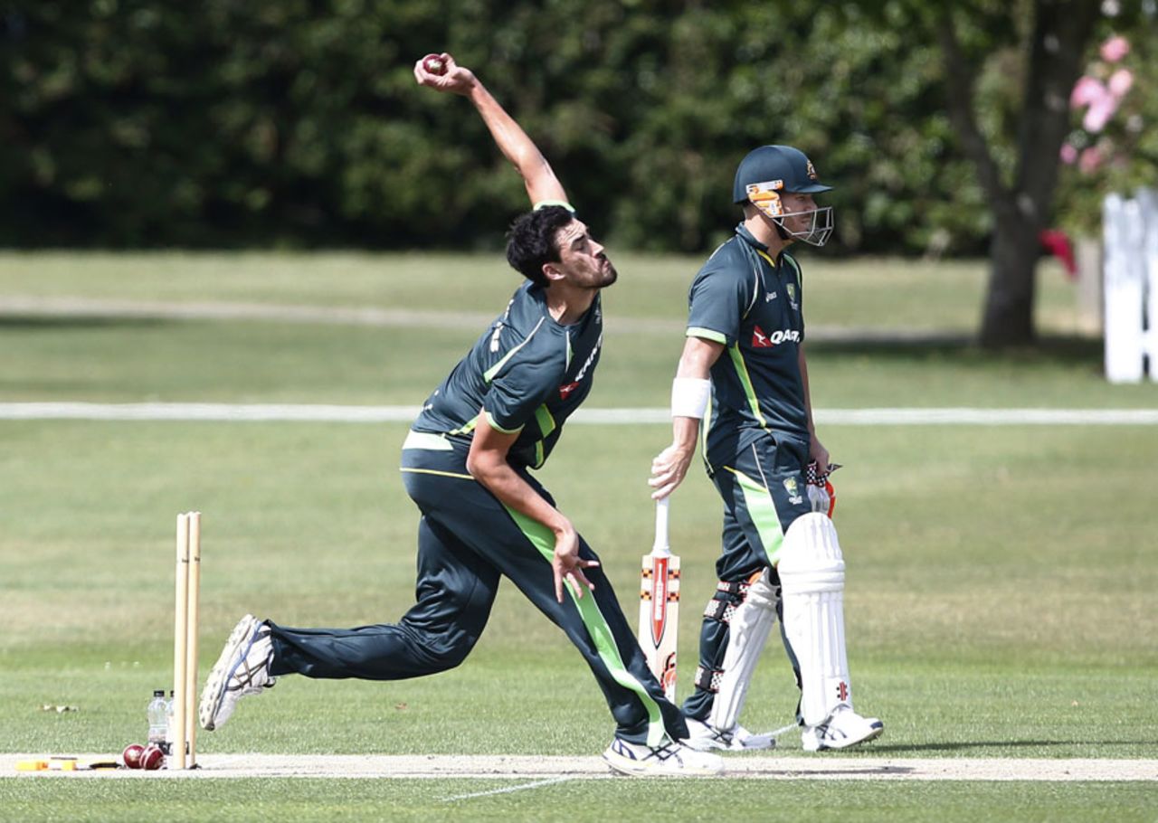 Mitchell Starc and David Warner participate in a training session, Watford, England, June 21, 2015