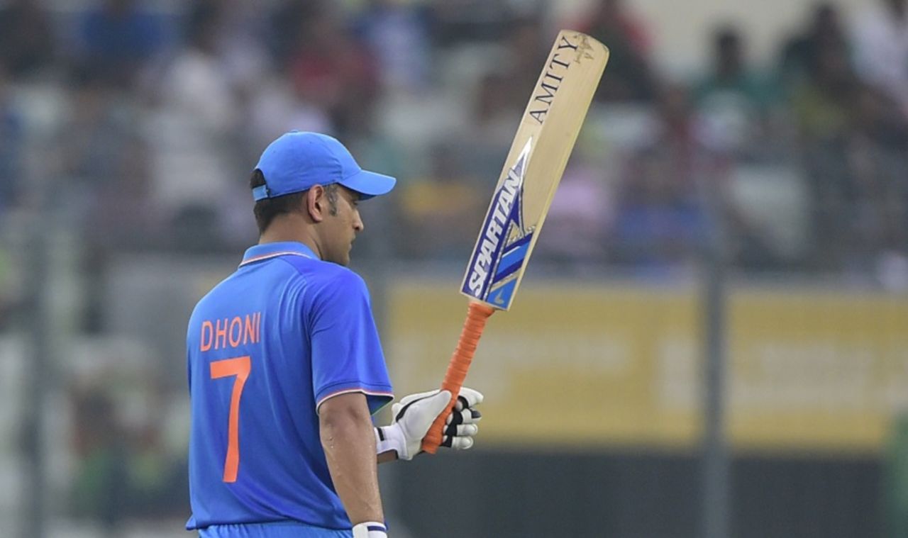 MS Dhoni acknowledges the cheers after completing his half-century, Bangladesh v India, 3rd ODI, Mirpur, June 24, 2015