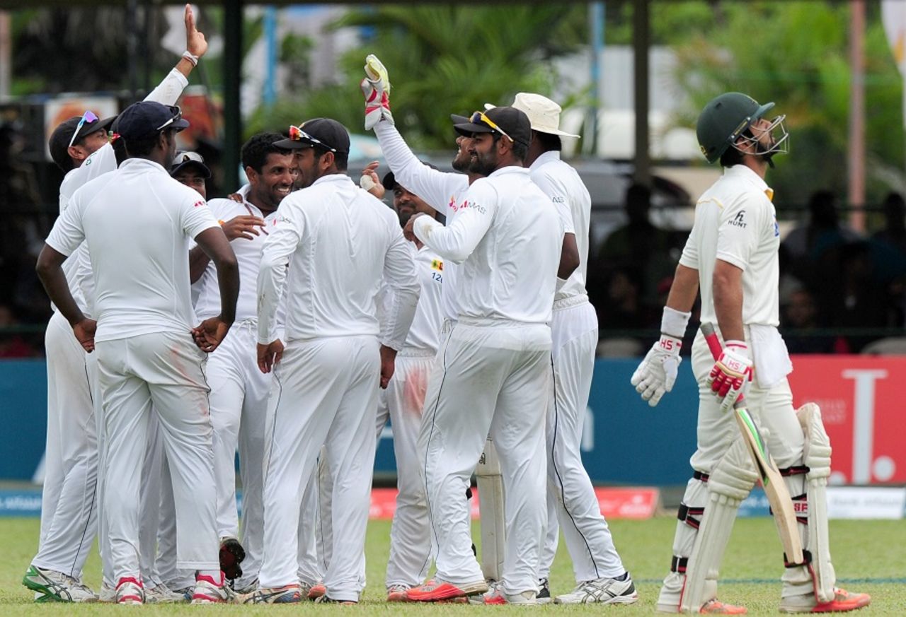 Dhammika Prasad is mobbed after removing Ahmed Shehzad, Sri Lanka v Pakistan, 2nd Test, Colombo, 3rd day, June 27, 2015