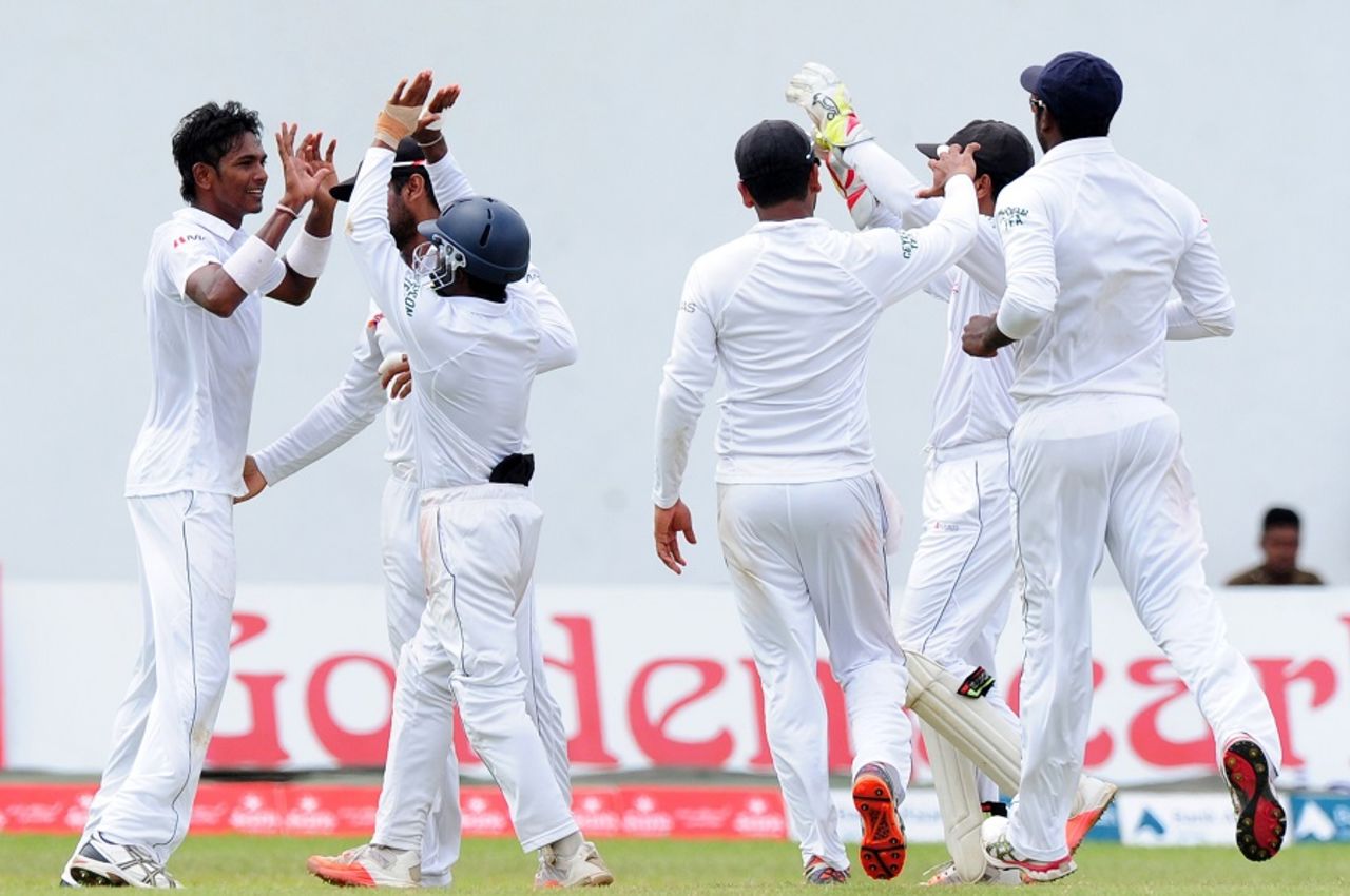 Dushmantha Chameera is congratulated on the wicket of Asad Shafiq, Sri Lanka v Pakistan, 2nd Test, Colombo, 4th day, June 28, 2015