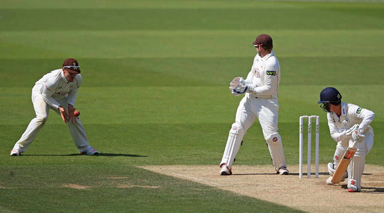 Jason Roy pouches a catch at slip to remove Will Tavare, Surrey v Gloucestershire, County Championship, Division Two, Kia Oval, 3rd day, June 29, 2015