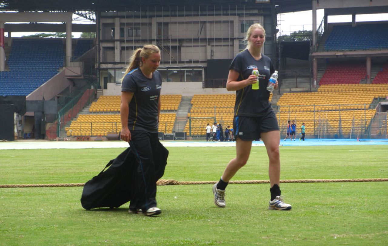 Leigh Kasperek and Hannah Rowe walk back after a practice session, Bangalore, July 2, 2015