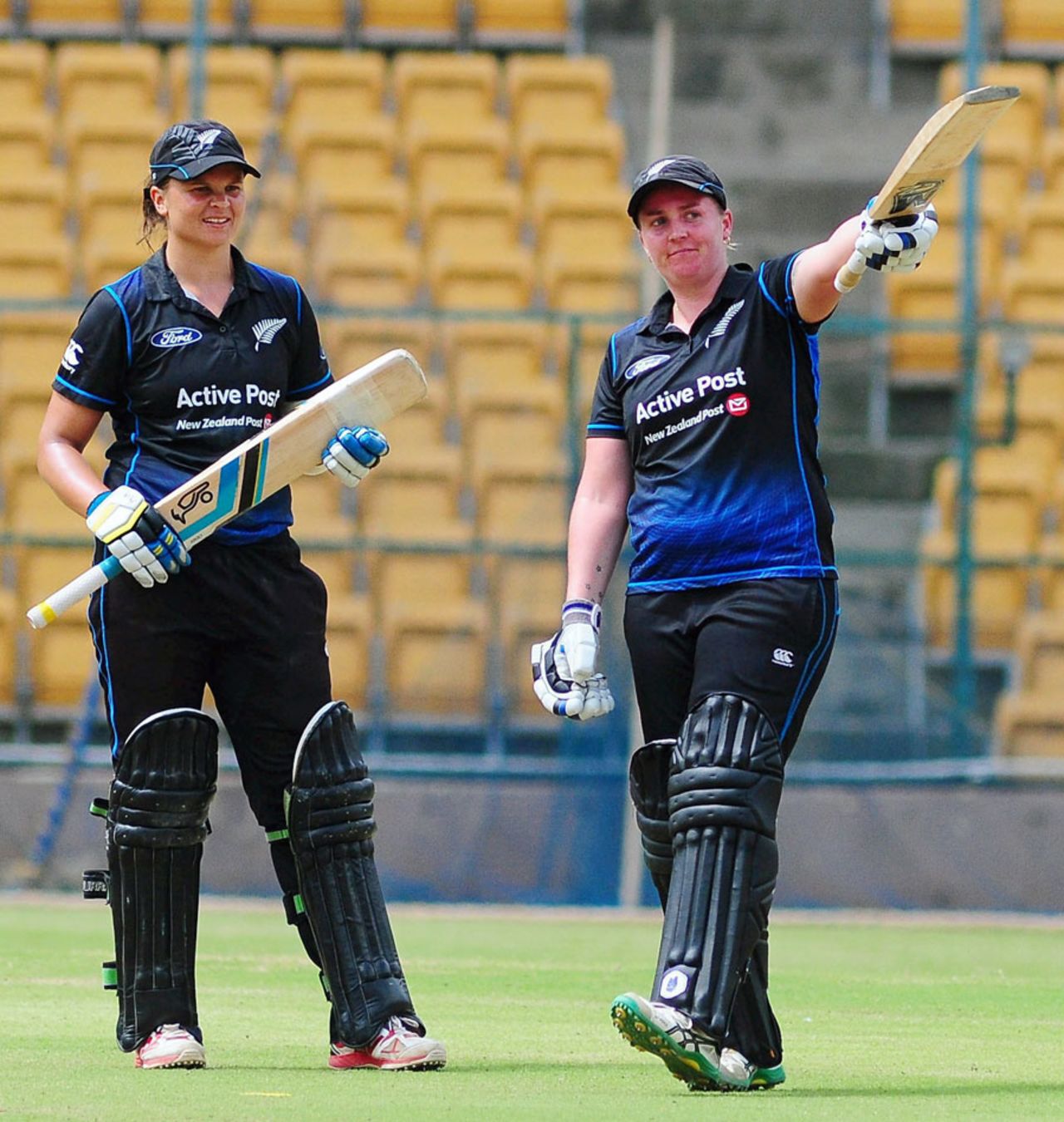 Rachel Priest raises her bat after scoring a half-century, India v New Zealand, 3rd Women's ODI, Bangalore, July 3, 2015