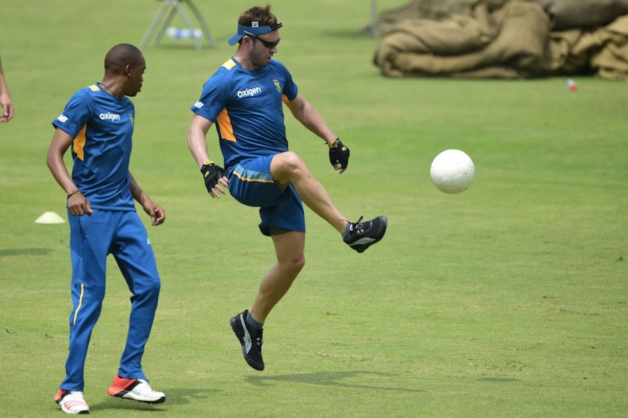 Bend it like AB: AB de Villiers is air borne during a training session, Mirpur, July 4, 2015