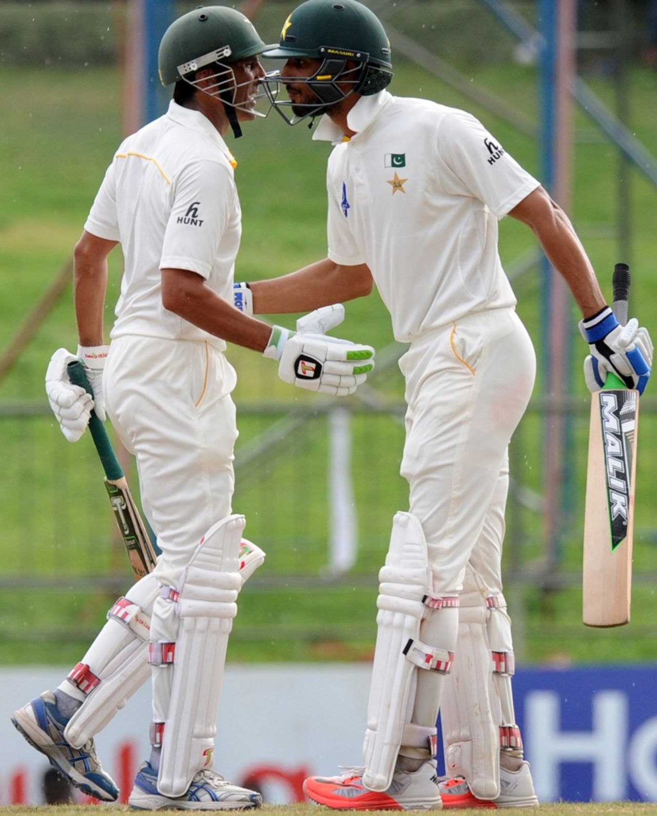 Shan Masood is congratulated by Younis Khan after he reached his fifty, Sri Lanka v Pakistan, 3rd Test, Pallekele, 4th day, July 6, 2015