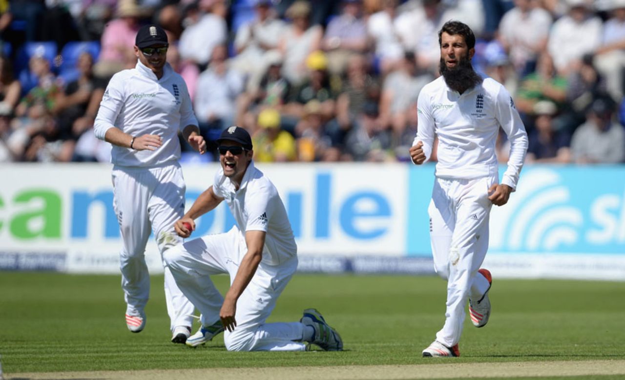 Ian Bell, Alastair Cook and Moeen Ali celebrate the key wicket of Steve Smith, England v Australia, 1st Investec Ashes Test, Cardiff, 2nd day, July 9, 2015