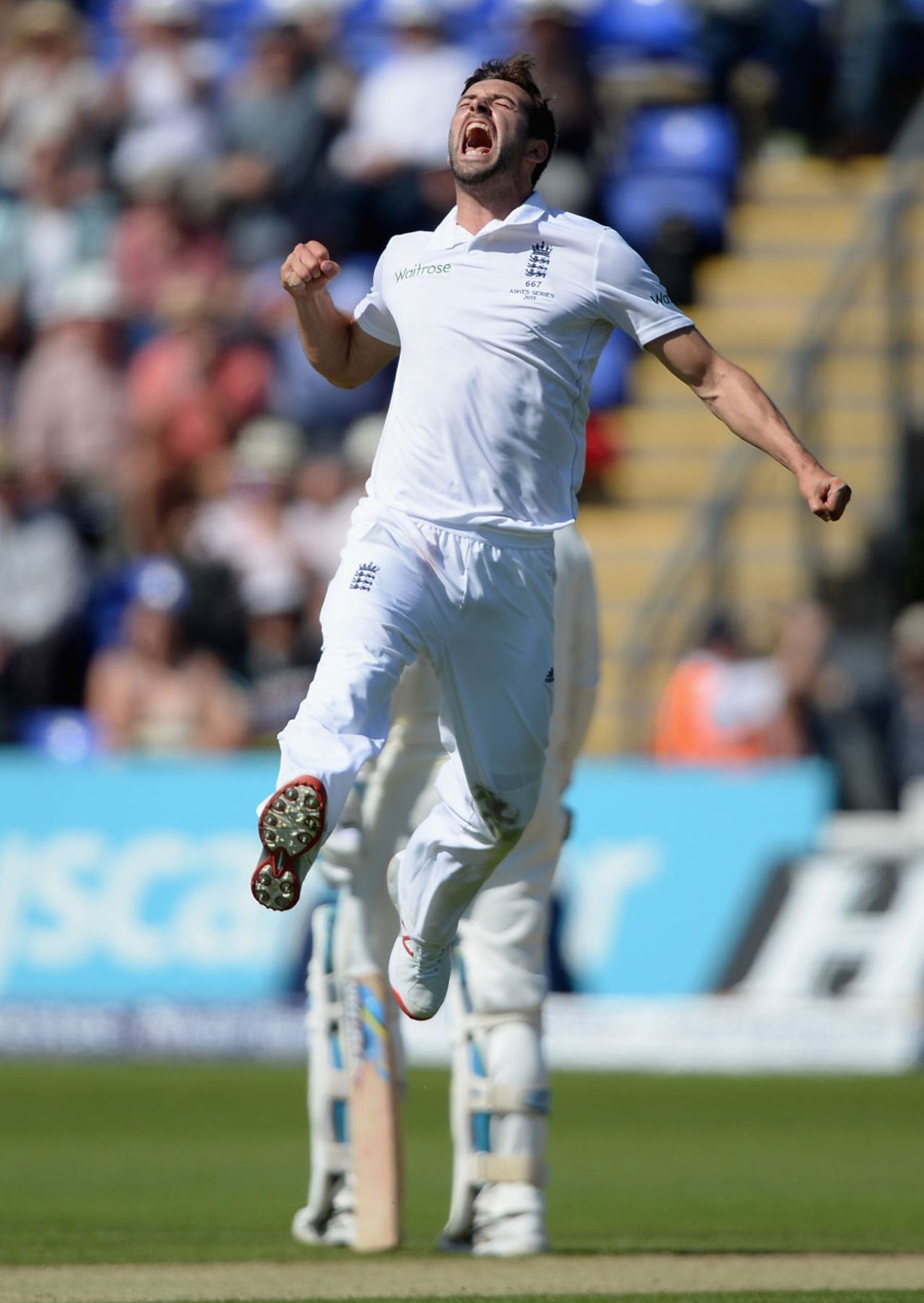 England's Mark Wood celebrates his first Ashes wicket, Chris Rogers for 95, England v Australia, 1st Investec Ashes Test, Cardiff, 2nd day, July 9, 2015