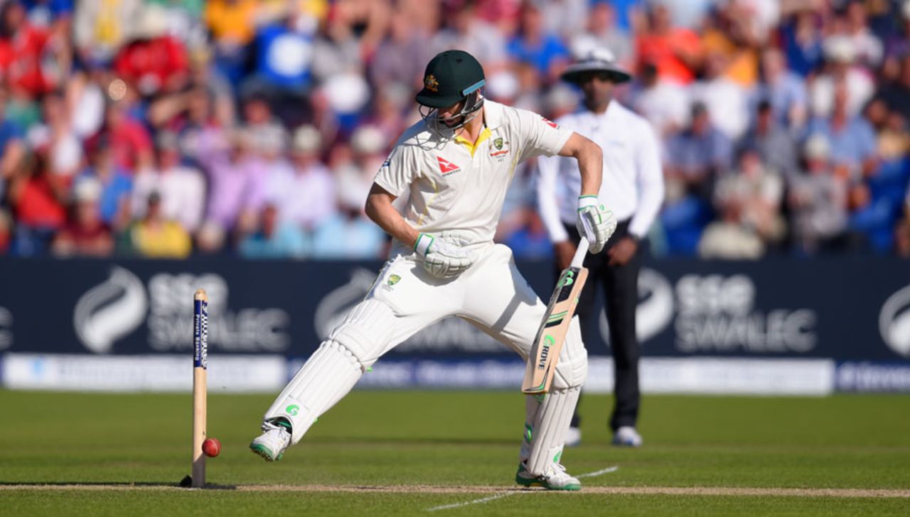 Adam Voges kicks the ball away from his stumps as it trickles back after he played defensively, England v Australia, 1st Investec Ashes Test, Cardiff, 2nd day, July 9, 2015