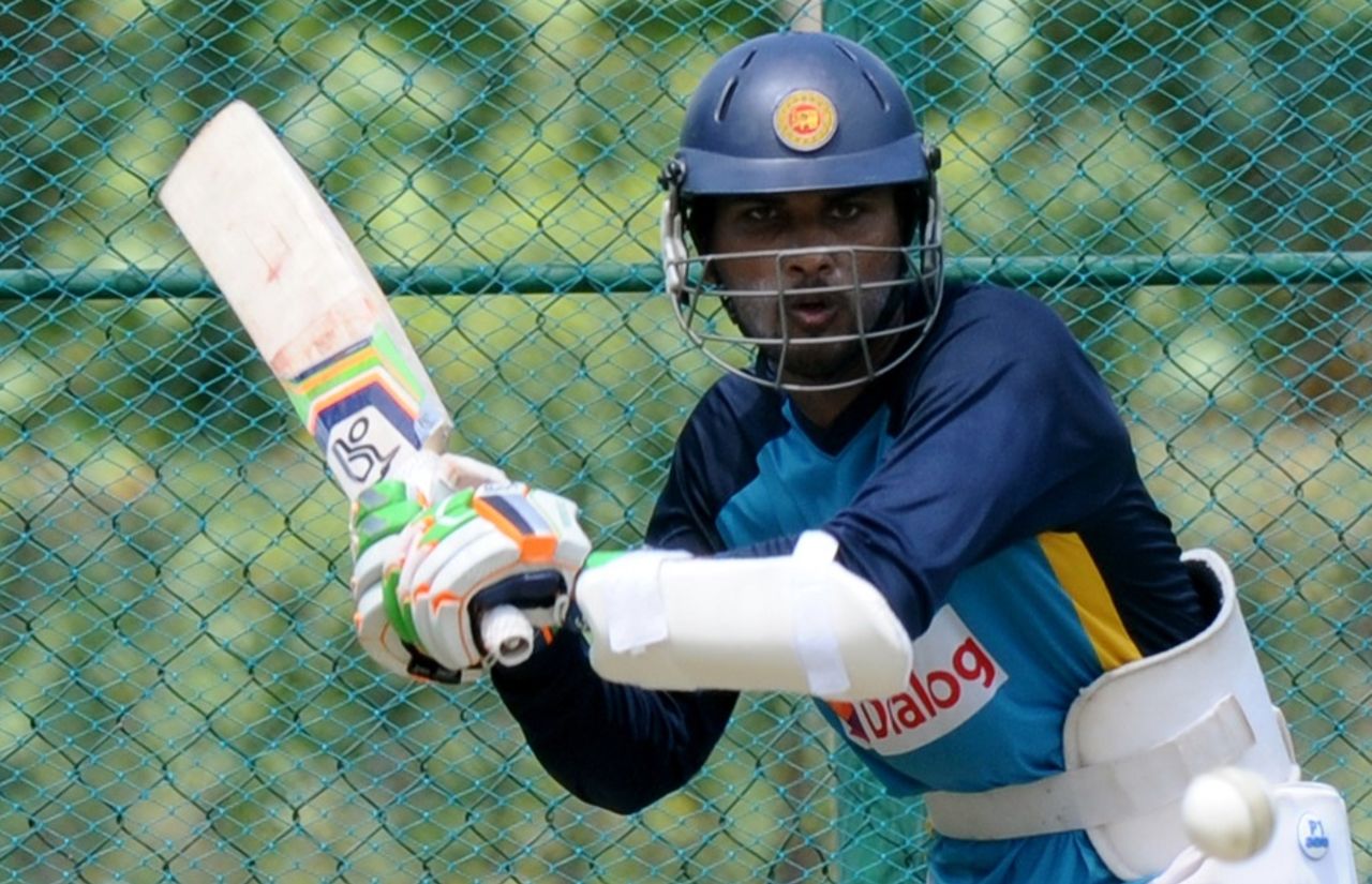 Dinesh Chandimal has a hit during Sri Lanka's practice, Dambulla, July 10, 2015