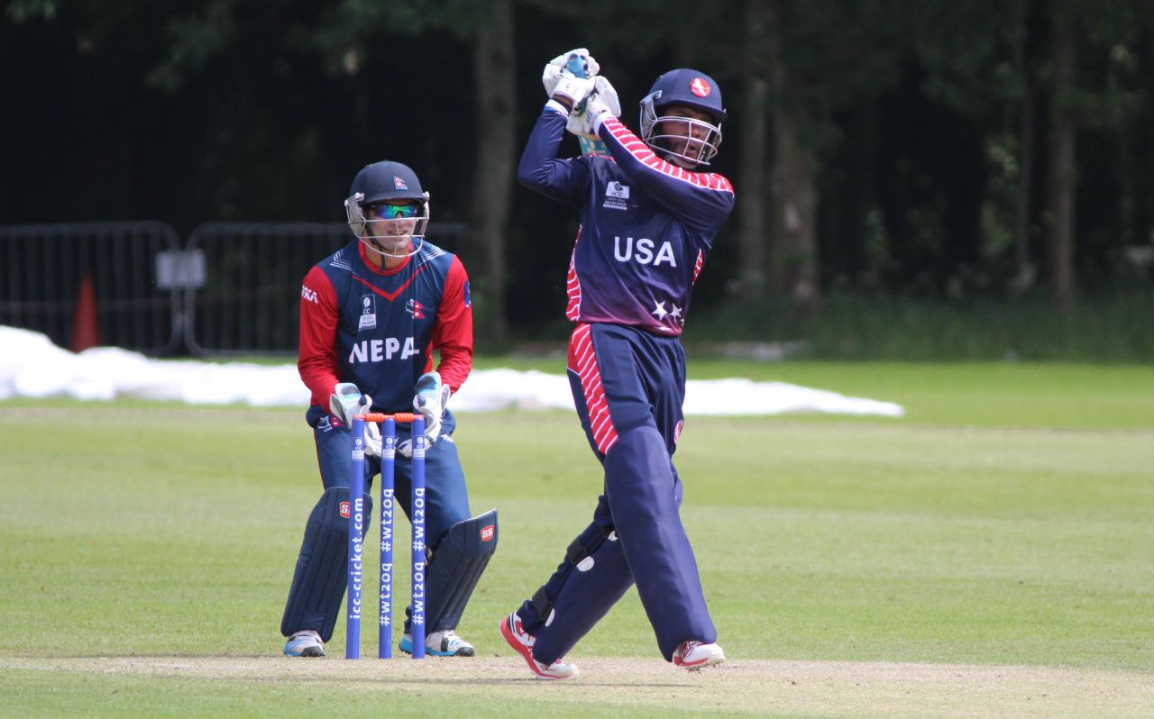 Akeem Dodson drives straight back down the ground, Nepal v USA, World Twenty20 Qualifier, Belfast, July 10, 2015