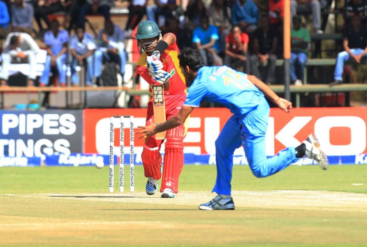 Chamu Chibhabha plays it back to the bowler, Zimbabwe v India, 3rd ODI, Harare, July 14, 2015