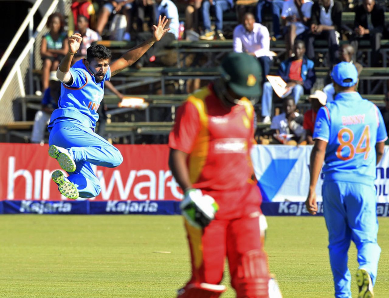 M Vijay clicks his heels together in celebration after dismissing Elton Chigumbura, Zimbabwe v India, 3rd ODI, Harare, July 14, 2015