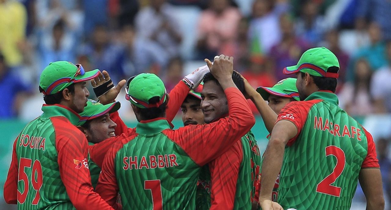 Shakib Al Hasan is congratulated by team-mates after he dismissed Hashim Amla, Bangladesh v South Africa, 3rd ODI, Chittagong, July 15, 2015