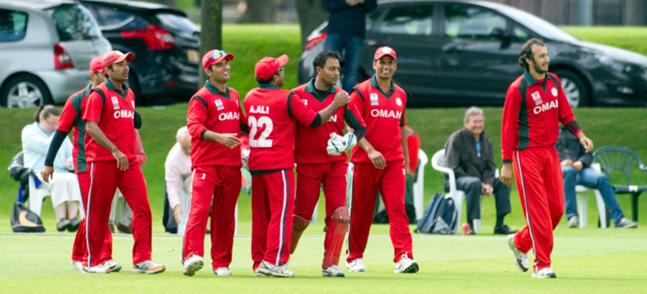 The Oman players get together after a wicket, Afghanistan v Oman, World T20 Qualifier, Edinburgh, July 15, 2015