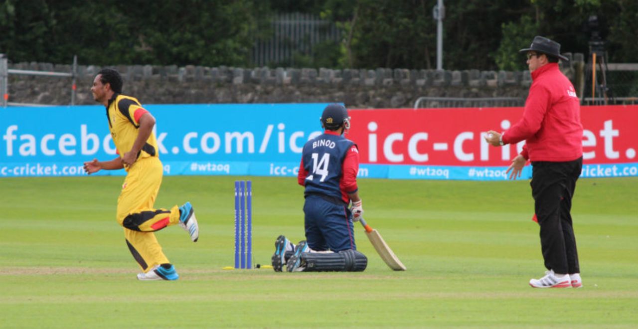 Binod Bhandari sits on his knees after being run-out by a direct hit, Nepal v Papua New Guinea, World T20 Qualifier, Group A, Dublin, July 17, 2015