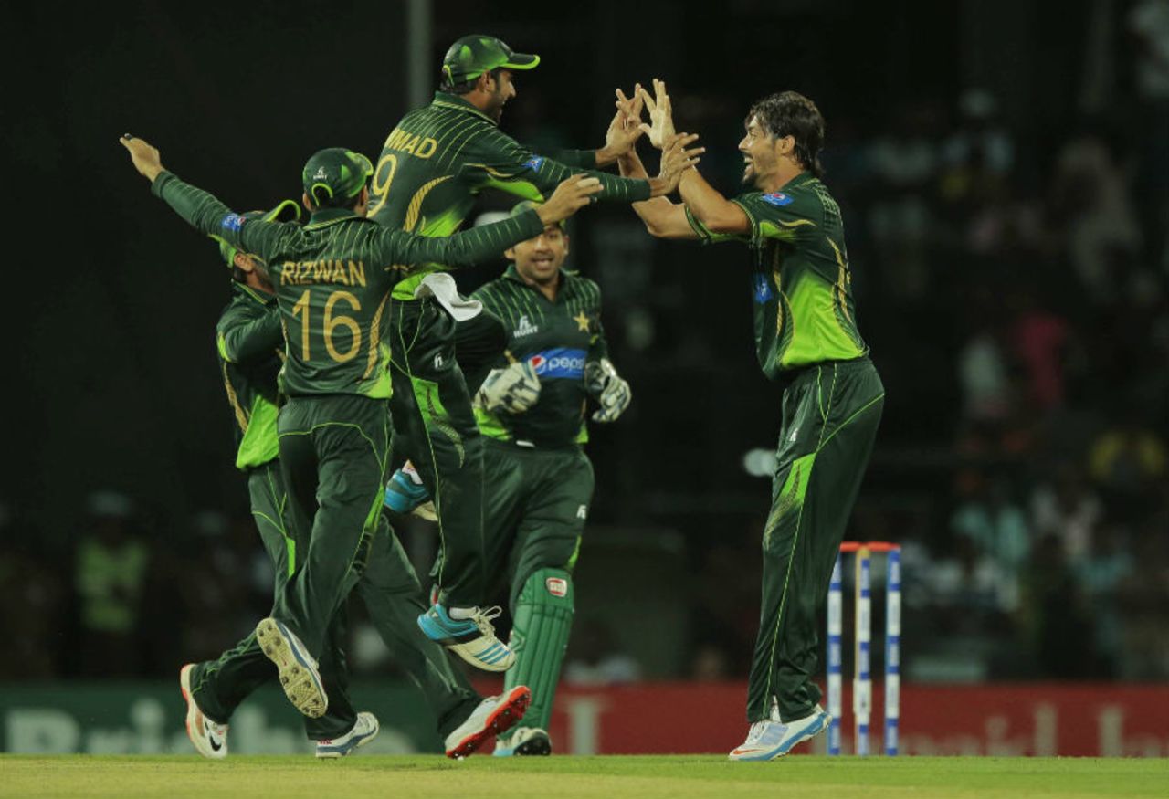 Anwar Ali is mobbed by his team-mates, Sri Lanka v Pakistan, 3rd ODI, Colombo, July 19, 2015