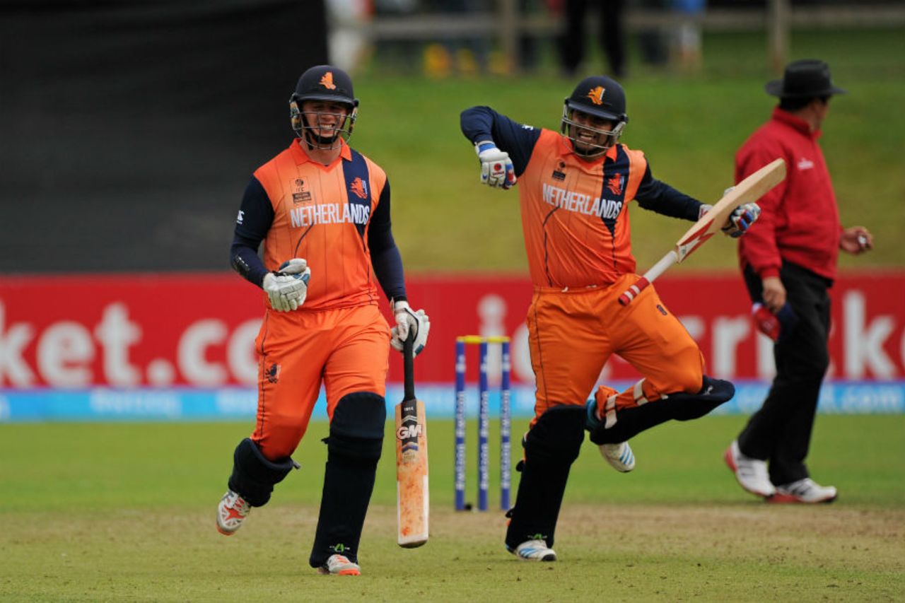 Mudassar Bukhari and Max O'Dowd celebrate after their win, Namibia v Netherlands, World T20, 2nd play-off,  Dublin, July 21, 2015