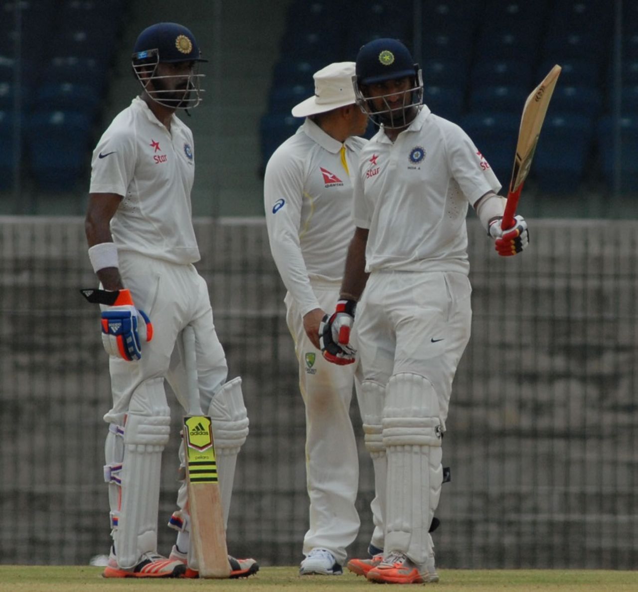 Cheteshwar Pujara raises his bat after completing his fifty, India A v Australia A, 1st unofficial Test, Chennai, 1st day