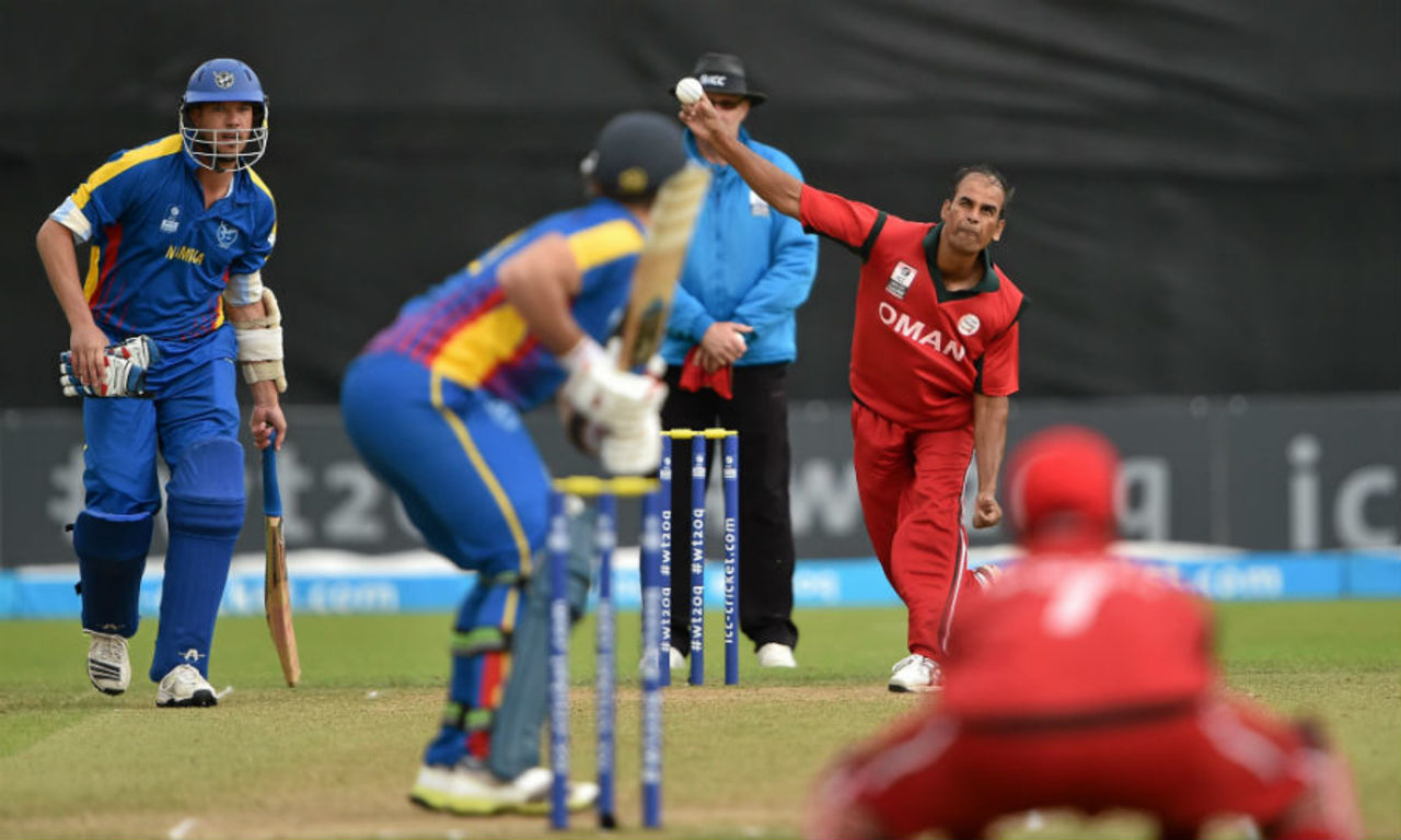 Munis Ansari picked up 3 for 23 in his four overs, Namibia v Oman, World T20 Qualifier, Play-off, Dublin, July 23, 2015