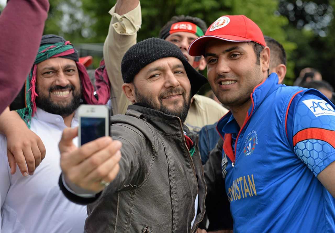 The celebratory selfie: Mohammad Nabi poses for a selfie with a fan, Afghanistan v Papua New Guinea, World T20 Qualifier, 3rd Play-off, Dublin, July 23, 2015