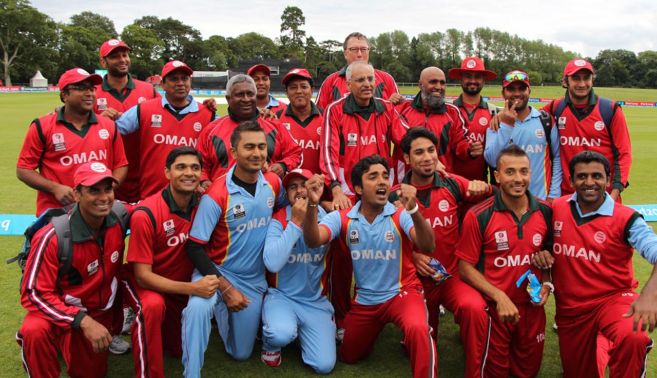 The Oman players pose after their five-wicket win against Namibia, Namibia v Oman, World T20 Qualifier, 4th qualifying playoff, Dublin, July 23, 2015