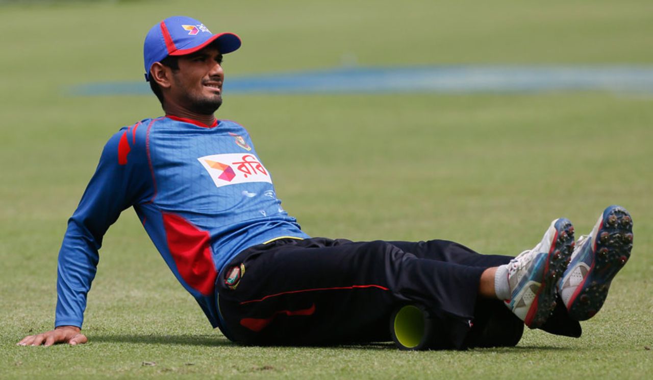 Mahmudullah stretches during training, Dhaka, July 28, 2015