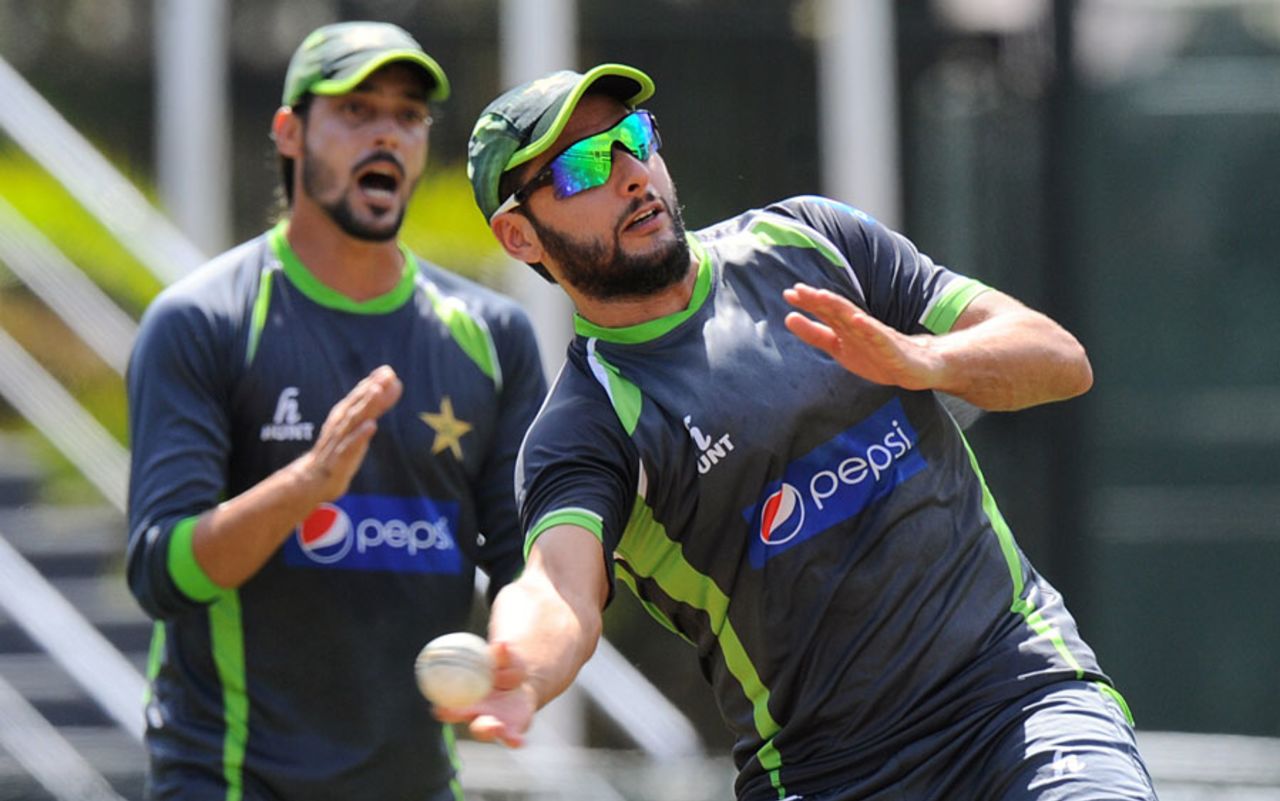 Shahid Afridi fields during a training session, Colombo, July 29, 2015