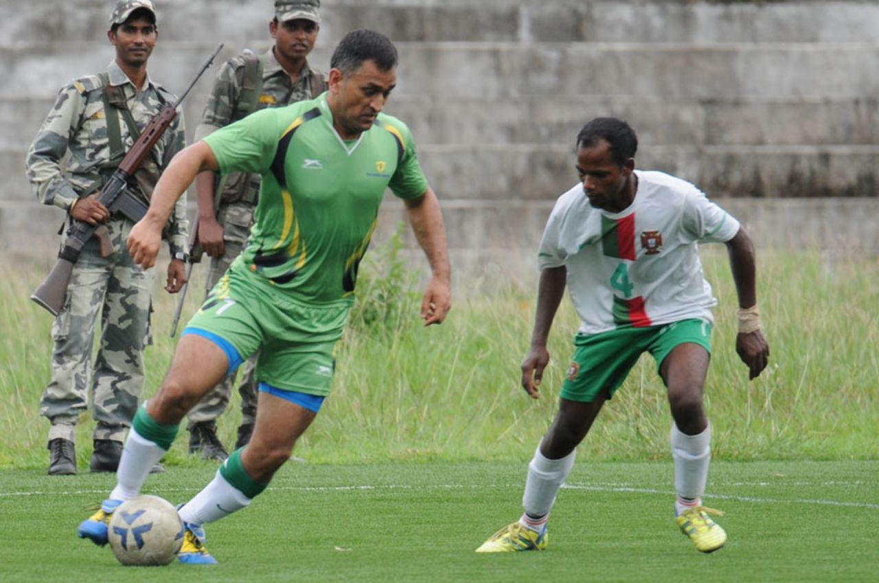 MS Dhoni displays his football skills during an exhibition match, Ranchi, July 29, 2015