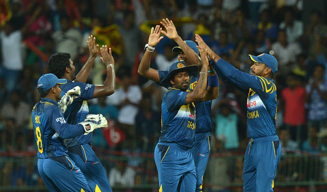 Thisara Perera and his team-mates celebrate the fall of a wicket, Sri Lanka v Pakistan, 1st T20I, Colombo, July 30, 2015
