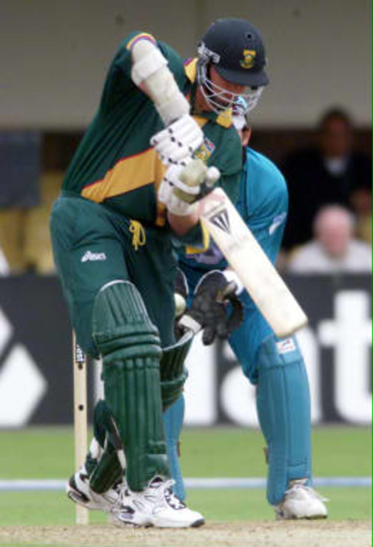 South Africa's Lance Klusener is bowled by New Zealand's Gavin Larsen 10 June 1999 during their Super Six match in the Cricket World Cup at Edgbaston