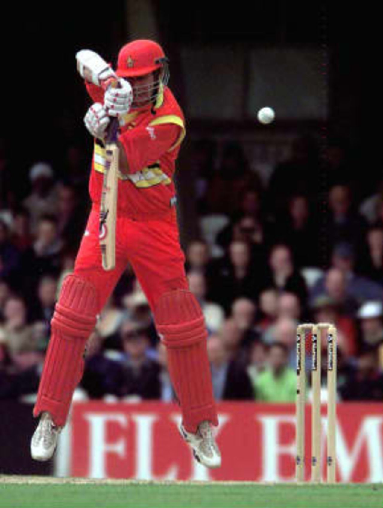 Zimbabwe opening batsman Neil Johnson takes evasive action against the ferocious bowling of Pakistan's Shoaib Akhtar during their Cricket World Cup Super Six match at The Oval in London 11 June 1999