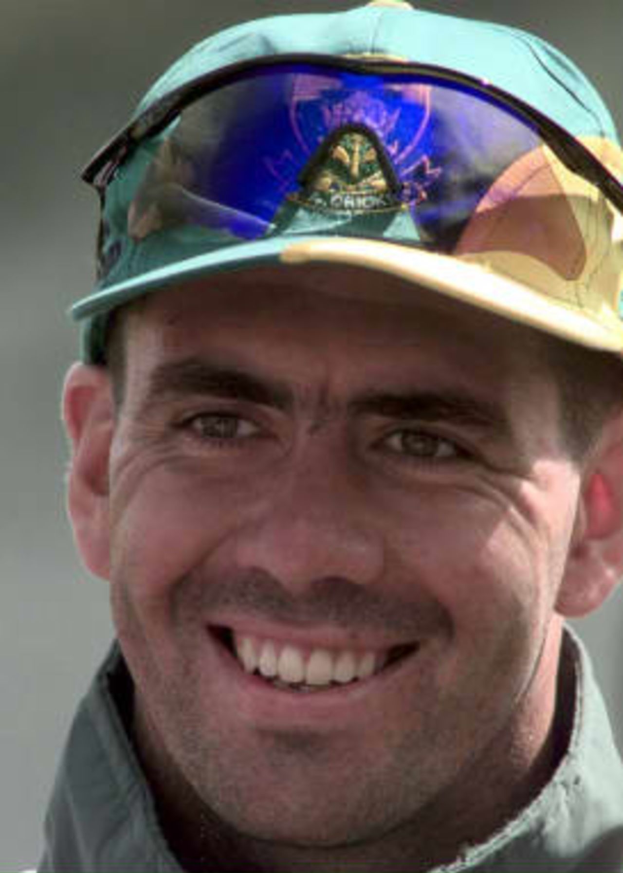South African captain Hansie Cronje smiles in the nets at Edgbaston in Birmingham, 16 June 1999, ahead of his team's Cricket World Cup semi-final clash against Australia 17 June.