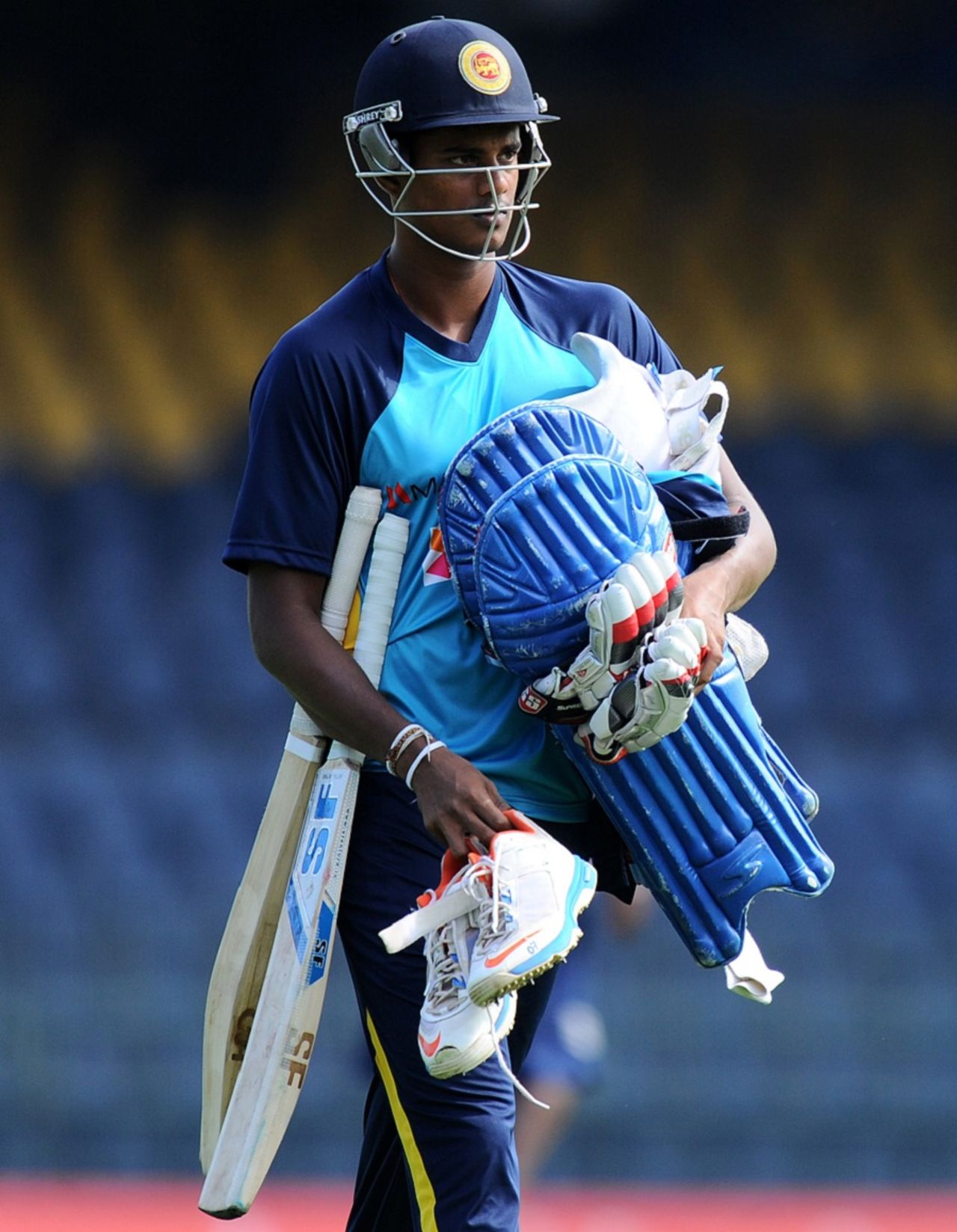 Binura Fernando has his hands full at Sri Lanka's practice, Colombo, July 29, 2015