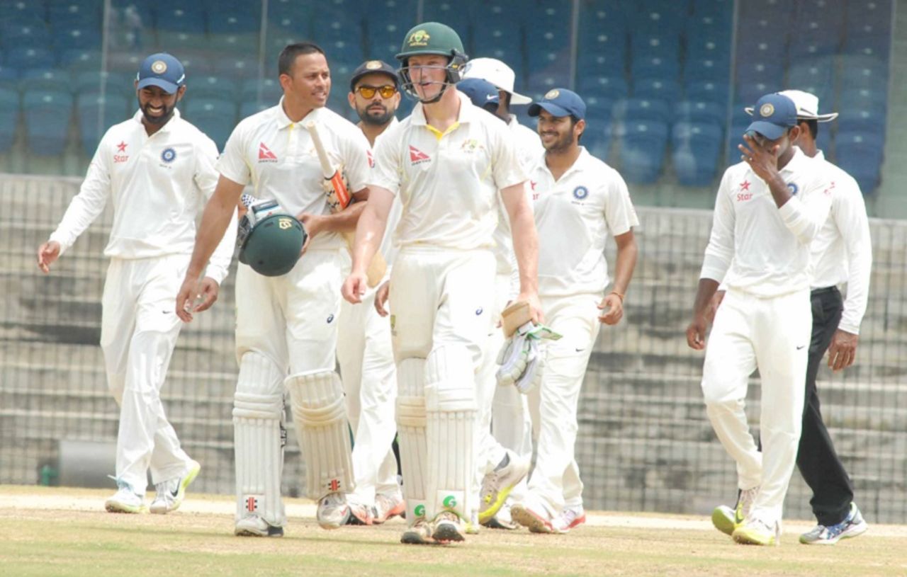Usman Khawaja and Cameron Bancroft walk off after sealing Australia A's win, India A v Australia A, 2nd unofficial Test, Chennai, 4th day, August 1, 2015 