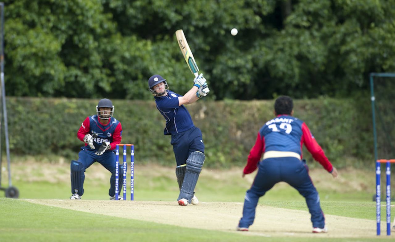 Matthew Cross smashes the ball down the ground, Scotland v Nepal, ICC World Cricket League Championship, Ayr, August 1, 2015