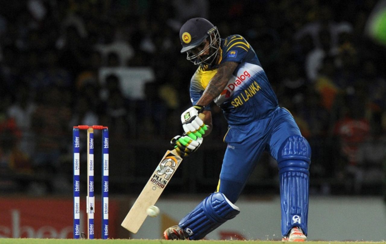 Chamara Kapugedera drills the ball through the off side, Sri Lanka v Pakistan, 2nd T20, Colombo, August 1, 2015