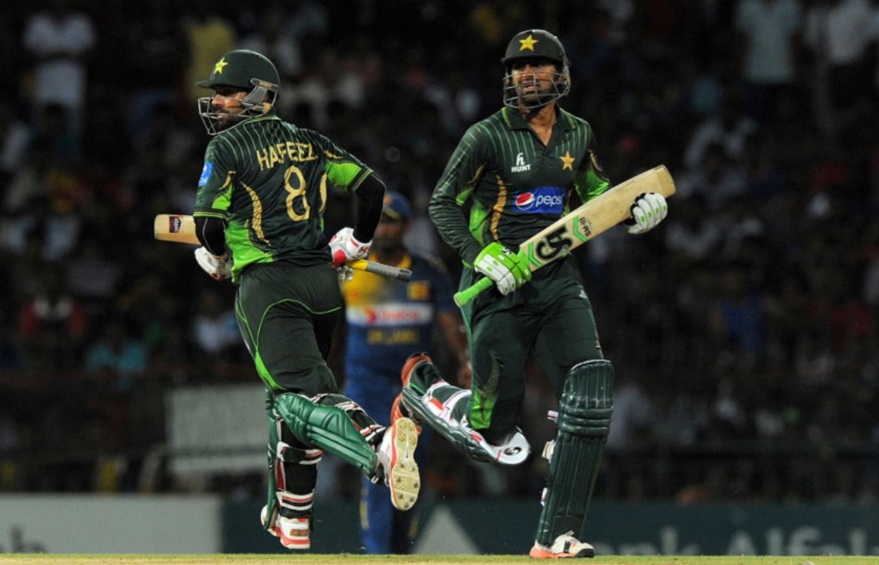 Shoaib Malik and Mohammad Hafeez complete a run, Sri Lanka v Pakistan, 2nd T20, Colombo, August 1, 2015 