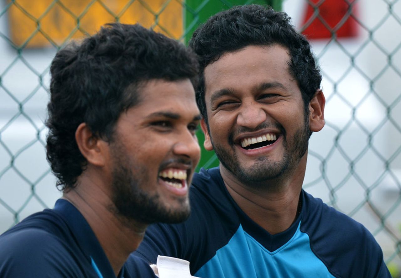 Dinesh Chandimal and Dimuth Karunaratne have a laugh, Galle, August 10, 2015