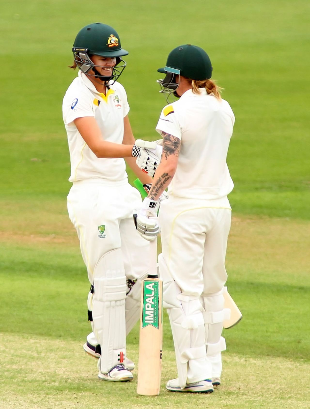Jess Jonassen gets a handshake for her half-century, England v Australia, Women's Ashes Test, Canterbury, 1st day, August 11, 2015