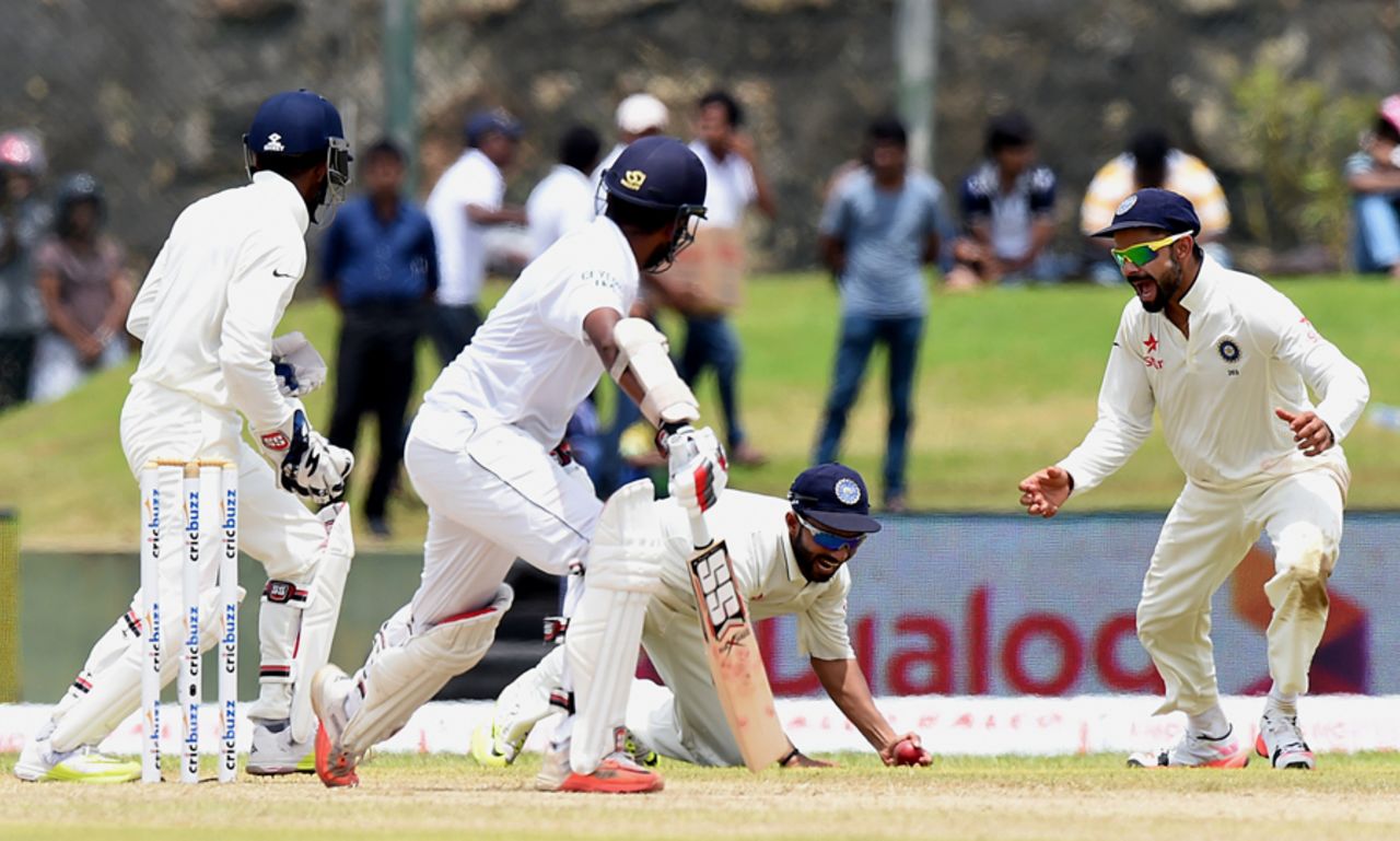 Ajinkya Rahane latches on to a low catch from Lahiru Thirimanne, Sri Lanka v India, 1st Test, Galle, 1st day, August 12, 2015