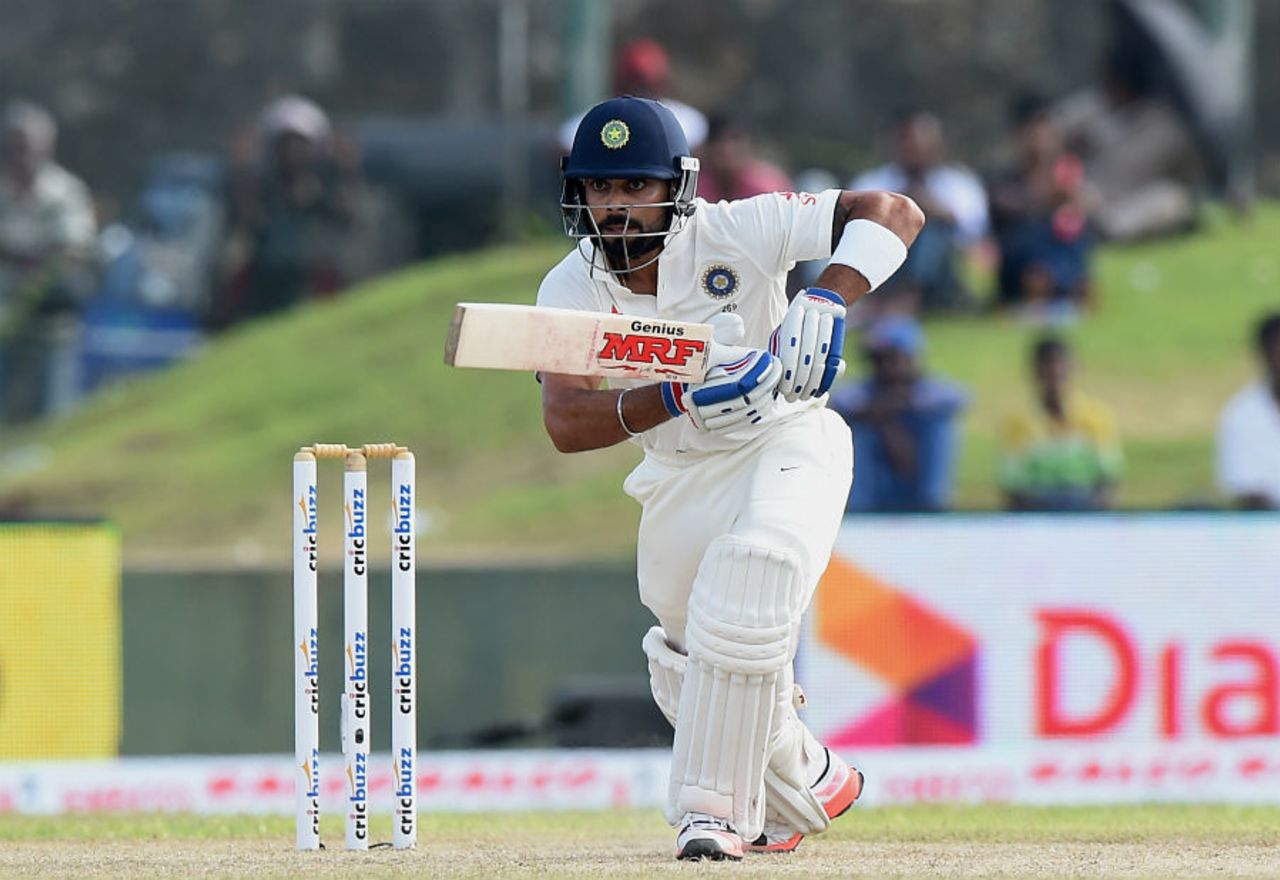 Virat Kohli watches the ball after driving it through cover, Sri Lanka v India, 1st Test, Galle, 1st day, August 12, 2015