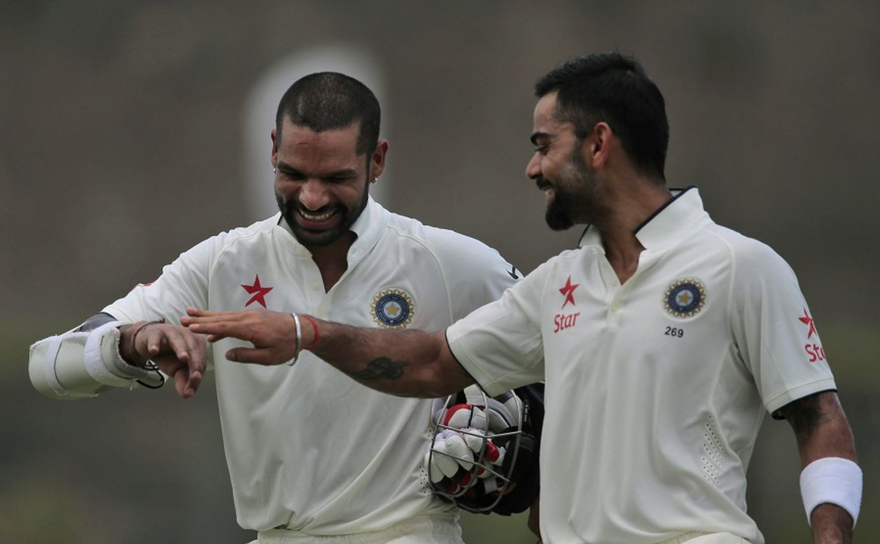 Shikhar Dhawan and Virat Kohli share a lighter moment, Sri Lanka v India, 1st Test, Galle, 2nd day, August 13, 2015